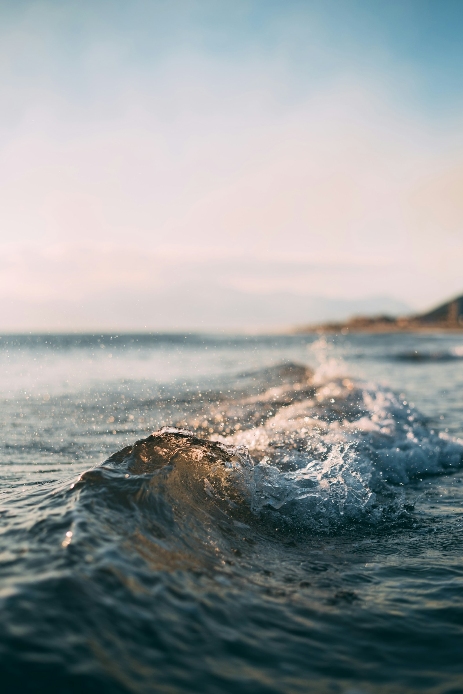 Ocean waves meeting a quiet shoreline